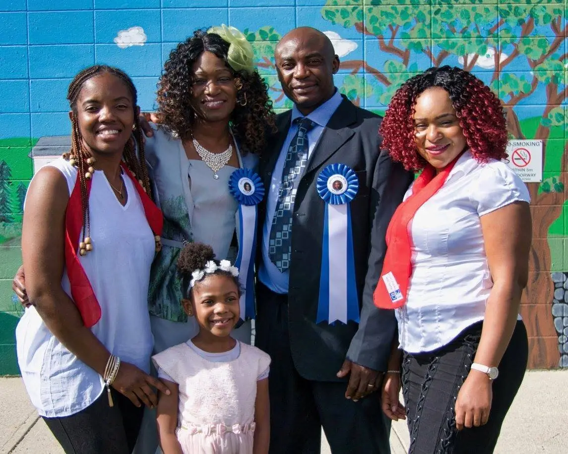 Graduate with family on graduation day at Canadian Bible Training Centres